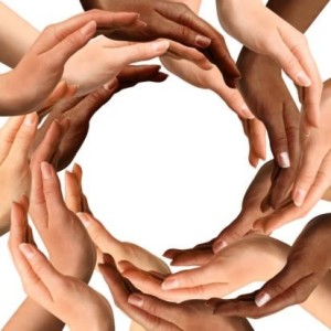 multi ethnic hands in circle